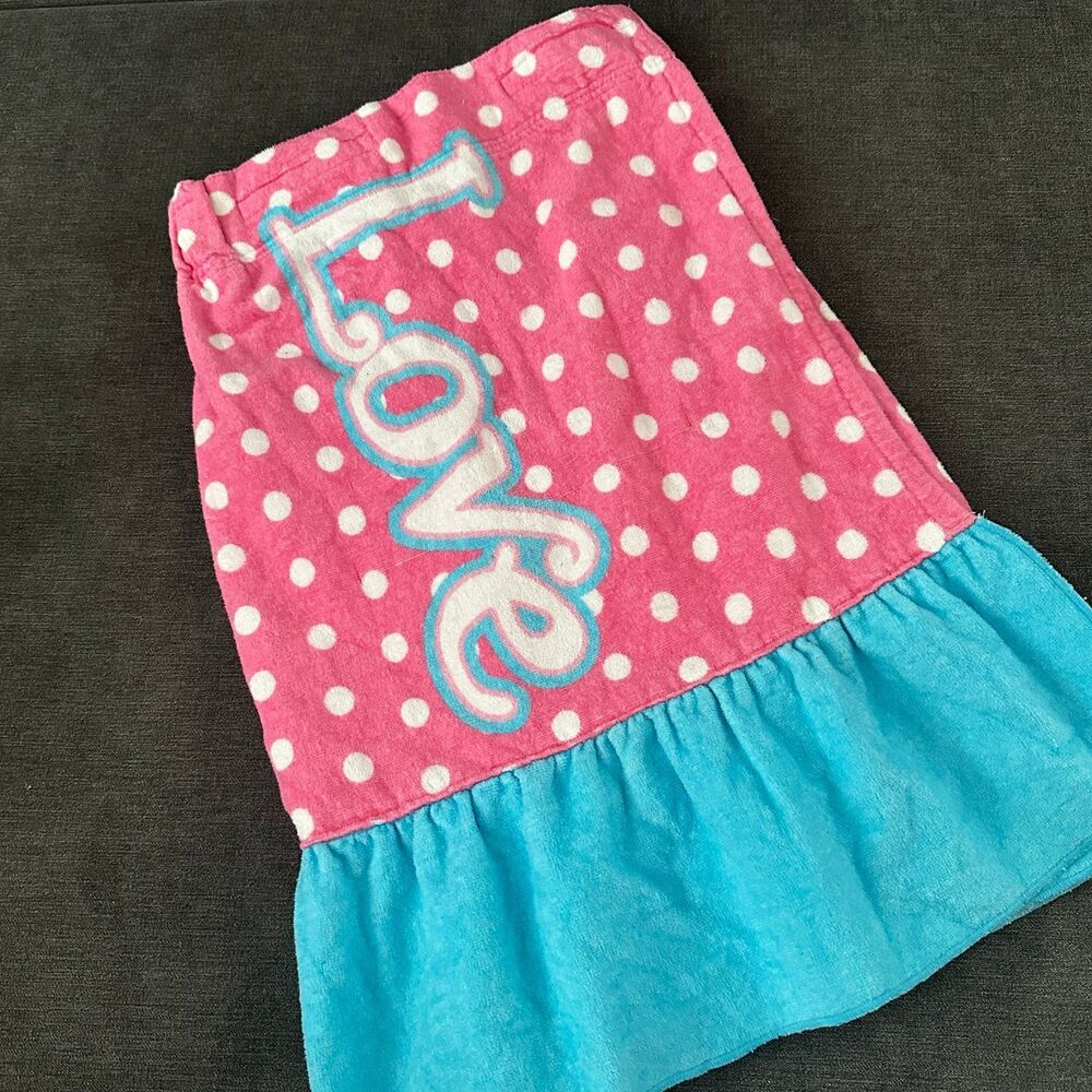Justice for Girls "Love" bath wrap coverup featuring a pink polka dot pattern